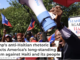Pastor Dieufort Fleurissaint denounces the hateful rhetoric aimed at Haitian migrants in Springfield, Ohio, during a Sept. 24, 2024, rally in Boston. Jessica Rinaldi/The Boston Globe/Getty Images)